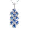Oval Sapphire and Diamond Halo Cluster Pendant Necklace in White Gold