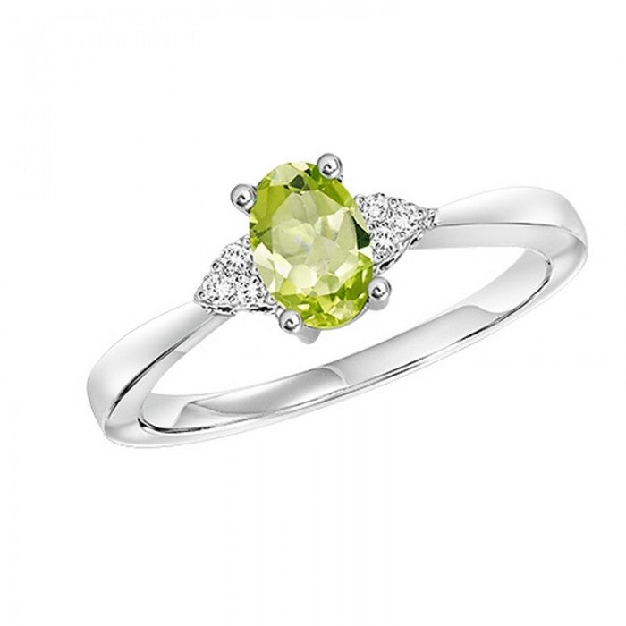 Oval-Shaped Peridot Ring with Trios of Side Diamonds