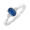 Oval-Shaped Sapphire Ring with Trios of Side Diamonds