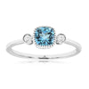 Cushion Cut Swiss Blue Topaz and Round Diamond Three Stone Ring in White Gold