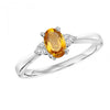 Oval-Shaped Citrine Ring with Trios of Side Diamonds